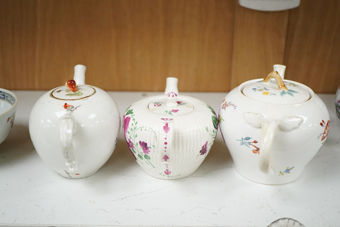 An 18th Furstenburg porcelain teapot and cover, a Wallendorf porcelain teapot and cover and a Meissen style teapot, 12cm high